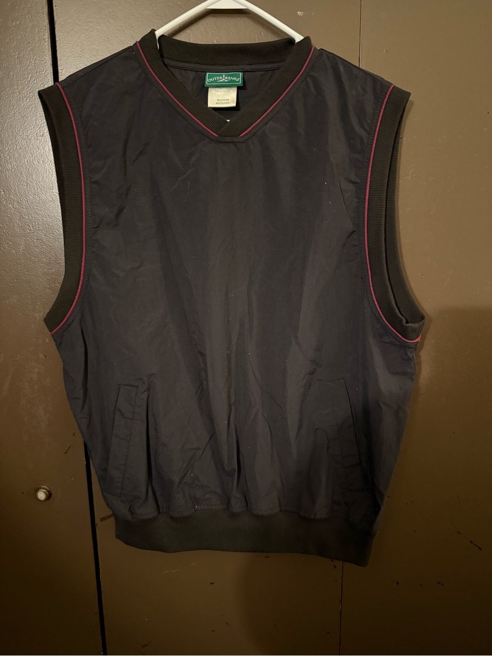 Outer Banks Black Sleeveless Golf Vest with Pink Piping